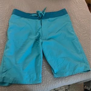 Old Navy Mens swim shorts, size 34, teal blue, tie front, back pocket, used